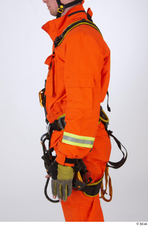 Photos Sam Atkins Fireman in Orange Coveralls arm upper body…
